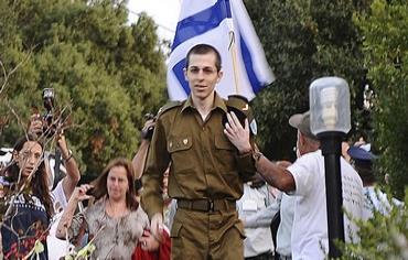 Gilad Schalit arrives from captivity Photo: REUTERS/Handout